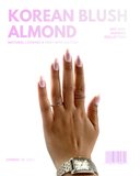 Korean Blush Almond press-on nails with soft blush pink tones and glossy milky white finish by NEWRUSH