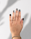 Full Moon Black XS Squoval luxury press-on nails with black base and silver cat eye effect by NEWRUSH