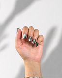 Full Moon Black XS Squoval luxury press-on nails with black base and silver cat eye effect by NEWRUSH
