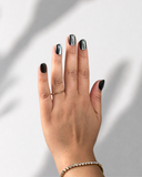 Full Moon Black XS Squoval luxury press-on nails with black base and silver cat eye effect by NEWRUSH