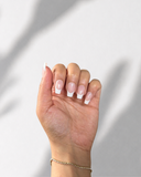 French Classic Ballerina luxury press-on nails with nude base and crisp white French tips by NEWRUSH
