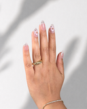 Madame Chérie Dot Almond luxury press-on nails with blush pink tones and elegant floral details by NEWRUSH