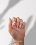 Madame Chérie Dot Almond luxury press-on nails with blush pink tones and elegant floral details by NEWRUSH