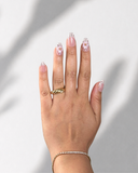Madame Chérie Dot Almond luxury press-on nails with blush pink tones and elegant floral details by NEWRUSH