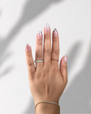 Leo Cat Blush Almond luxury press-on nails with blush pink tones and leopard-inspired accents by NEWRUSH