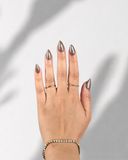Nougat Chrome Almond luxury press-on nails with taupe chrome finish by NEWRUSH