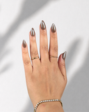 Nougat Chrome Almond luxury press-on nails with taupe chrome finish by NEWRUSH