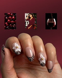 Mon Chérie Dot Almond luxury press-on nails with floral accents and French dot details by NEWRUSH