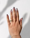 Mon Chérie Dot Almond luxury press-on nails with floral accents and French dot details by NEWRUSH